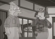 ClancywithabeS27E5.png (569 KB) His ghost with Grampa Simpson in "Treehouse of Horror XXVI"