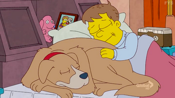 Homer is sleeping with his dog