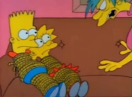 Lucille tying up Bart and Lisa.