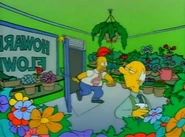 Homer rushes to buy Marge a flower.