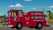 Homer Riding The SpringField Fire Truck