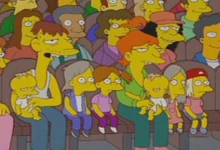 Bradine sentado com Cletus e uns dos seus filhos.