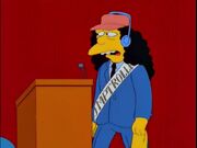 Otto with blue headphones