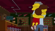 Maya and Moe hugging after becoming engaged (Homer is singing in the background)