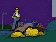 Homer knocked out by Louie of Midnight Towboy