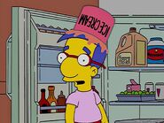 Milhouse looking through the refrigerator