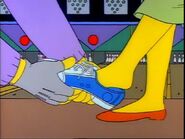 Jacques puts on Marge's bowling shoe