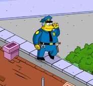 Wiggum patrolling Springfield.