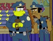 Lou and Chief Wiggum.