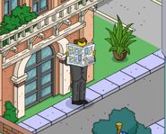 Wayne awakening the sleeper agent (with newspaper)