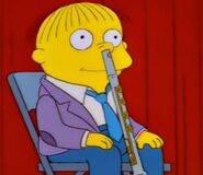 Ralph with a Flute up his nose.