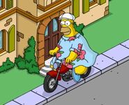 King-Size Homer riding around town.