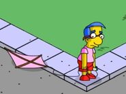 Milhouse flying a kite.