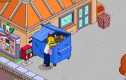 Cletus digging through garbage.