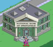 Clownface robbing the National Bank of Springfield.