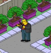 Fat Tony playing the violin.
