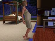 A Sim in her third trimester of pregnancy in The Sims 3