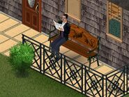 A Sim reading the Newspaper in The Sims.
