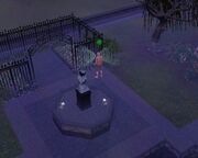 A Sim is scanning for spirits in graveyard.