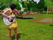 A Sim playing guitar in the park