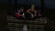 Two Sims sharing a drink.