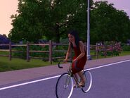 Bella riding her bike to Mortimer's house