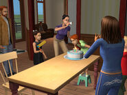 Twin Birthday. Angela is the one blowing out the candles. The dimly-seen girl on the couch in the background is Lilith.