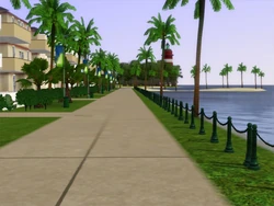 Various palm trees alongside a custom Sims 3 's road.