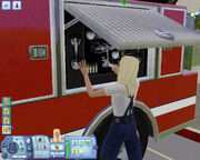 Sim maintaining the fire truck, TS3 Ambitions