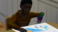 The Sims 4 child.png (589 kB) Un niño jugando con la mesa de actividades.