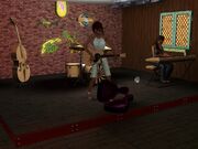 Sim playing guitar