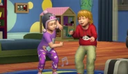 Two toddlers dancing.