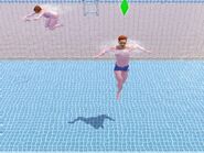 A Sim swimming in a pool in The Sims 3.