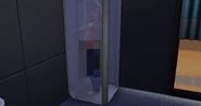 Geoffrey taking a shower with blue sweatpants in The Sims 4.
