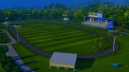 Copperdale High School football field. Goal post objects make their Sims debut, but the endzones are heavily rounded off (Sometimes done in Canadian football, but not to this extent).