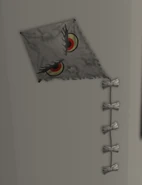 An evil Brinks' Kite hanging on the wall.