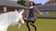 A Sim being blessed by a unicorn.