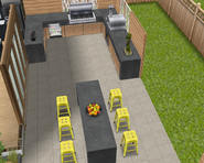 Seating area with pizza oven and grill