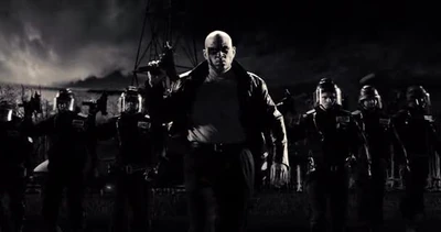 The Painted Cop (Ryan Rutledge) and his squad, armed with 9mm Micro Uzis.