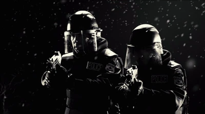 Two officers approach Hartigan with Micro Uzis before being killed.