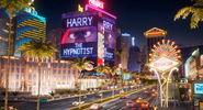 A building's Titantron advertising for Harry the Hypnotist.
