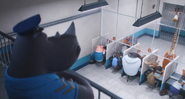 A rhino guard watching over inmates and their visitors.