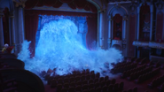 The flood destroying the theater.