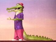 The crocodile auditions to be a part of the singing competition by rapping "The Humpty Dance" by Digital Underground.