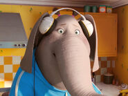 Meena learns about the singing competition from her mother and her grandfather.