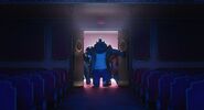 The bears enter the theater.
