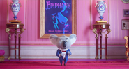 Buster standing in front of a poster for Epiphany.