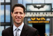 Shapiro in front of The Dark Knight Coaster at Six Flags Great America.