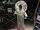 A hazmat figure In Flight of Fear's queue.jpg
