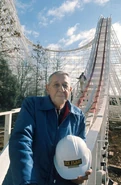 Designer John Allen standing at the bottom of Screamin' Eagle's 100 foot drop (February 2, 1976)